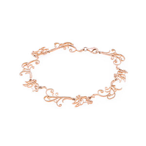 Rose gold tone blush silver Baby B bracelet, swirling pattern bracelet 